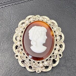 Elegant Cameo Brooch with Silver and Brown Accents